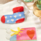 Sock shaped sniffing toy